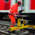 Amberg_Tamping_Broch_en